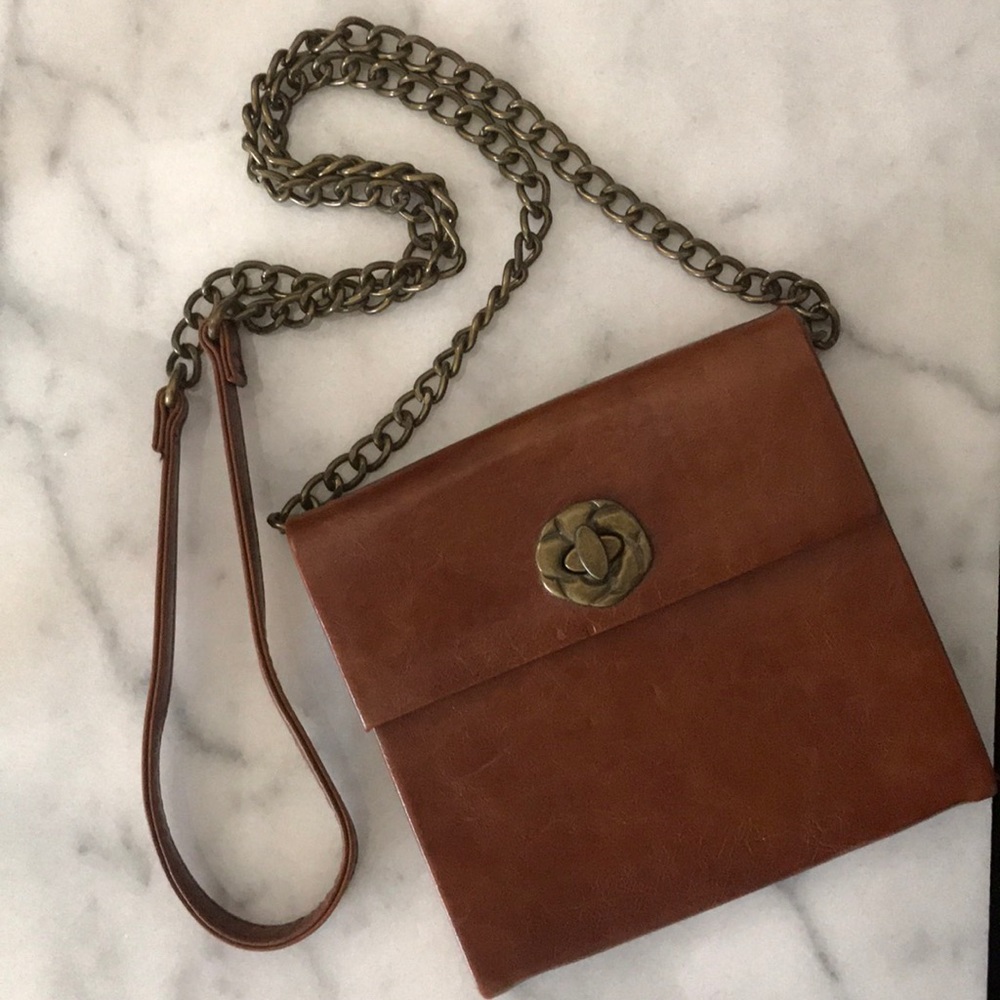 Brown vegan leather crossbody bag.
